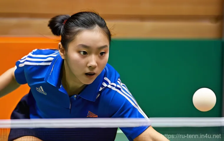 탁구 경기 중 흔한 실수와 대처법 - **Dynamic Ready Stance and Footwork:**
    "A professional male table tennis player, in peak physica...